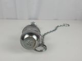 a silver cup with a chain attached to it