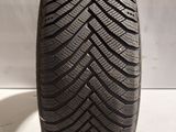 a close up of a tire on a white surface