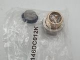 a small piece of metal that is sitting on a plastic bag