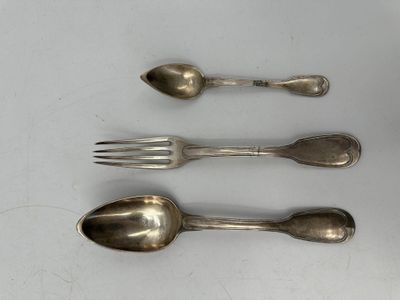 three silver spoons and a fork on a white surface