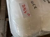 a bag of rice sitting on top of a wooden pallet