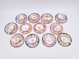 a lot of plates that are sitting on a table