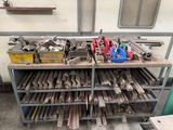 a workbench with many tools on it in a garage