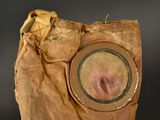 a brown bag with a hole in it that has a hole in it