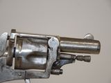 a close up of a revolver with a metal barrel