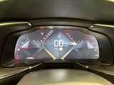 the dashboard of a car with a digital display on it