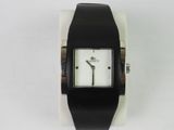 a black and white wrist watch with a white face