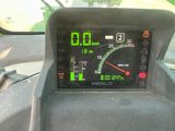 a close up of a dashboard with a clock on it
