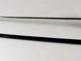 two different types of swords on a white surface