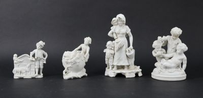 a group of white figurines sitting on top of a table