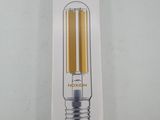 a close up of a light bulb in a box on a table