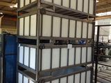 a large stack of containers sitting in a warehouse