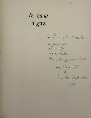 an open book with a handwritten poem on the cover