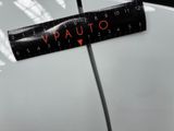 a close up of a sticker on the hood of a car