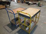 a cart with a wooden table on it in a warehouse
