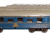 a blue and silver train car on a white background