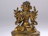 an image of a statue of a woman sitting on top of a bowl