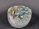 a small glass bowl with a floral design on it
