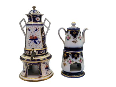 two teapots and a coffee pot sitting next to each other