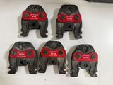 six black and red elephant shaped keys on a white surface