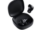 a pair of black earphones in a case on a white background