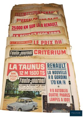 several old newspapers are stacked on top of each other on a table