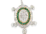 a diamond and emerald turtle broochle
