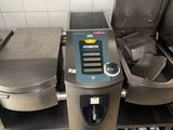 an image of a commercial kitchen with stainless steel appliances