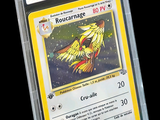 a close up of a pokemon card in a plastic case