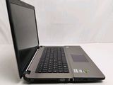 a laptop that is sitting on a white table