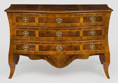 the chest of drawers is made of wood and has four drawers