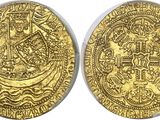 a gold coin with an image of a ship on it