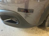 a sticker on the bumper of a car that says outrun