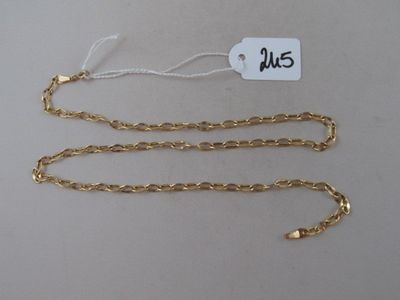 a close up of a gold chain with a price tag on it