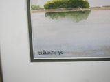 a watercolor painting of a small island in the middle of a lake
