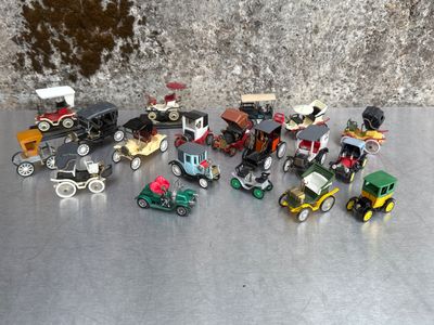 a lot of toy cars that are sitting on a table