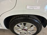 a white car with a sticker on the side of it