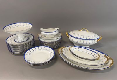 a lot of plates and bowls that are on the table