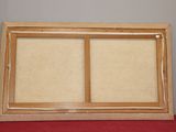 a picture of a picture frame on a red table