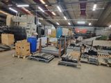 a large warehouse filled with lots of different types of machinery