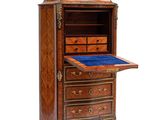 an image of a wooden cabinet with drawers and drawers