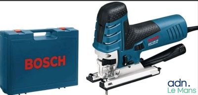 une raboteuse Bosch avec une boîte à outils et une mallette à outils