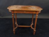 a small wooden table with a drawer on top of it