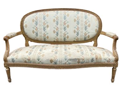 an image of a couch with a floral upholstered back