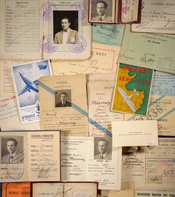 many old papers and old photos on the wall
