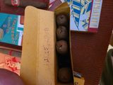 a box of chocolates sitting on top of a table