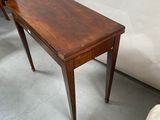 a small table that is sitting on the floor