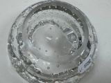 a close up of a glass of water with a label on it