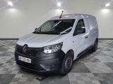 the white van is parked on a checkered floor in a room