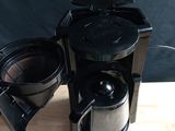 a coffee maker that is sitting on a table